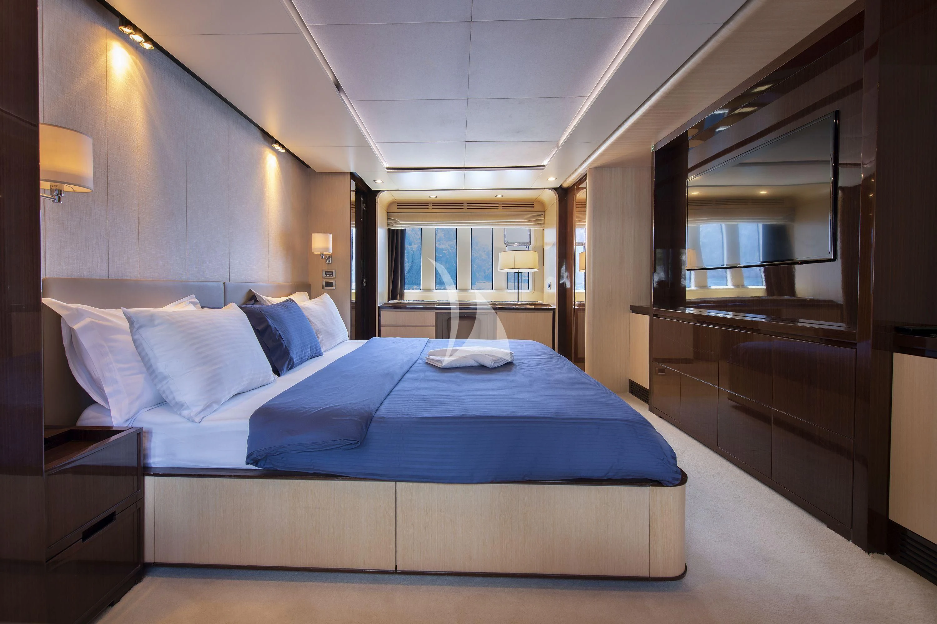 a bed in a room aboard HUBO Yacht for Sale