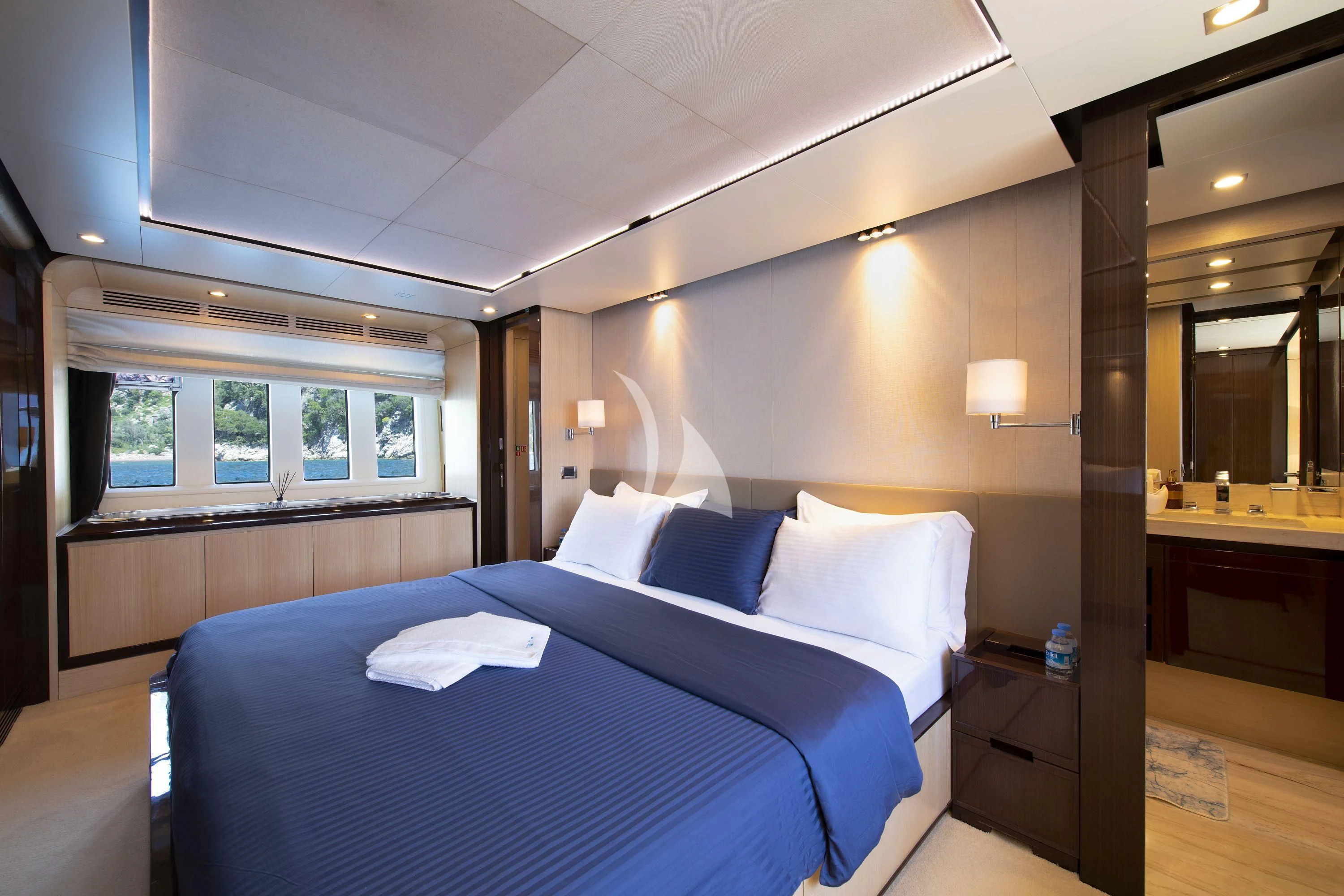 a bed in a room aboard HUBO Yacht for Sale