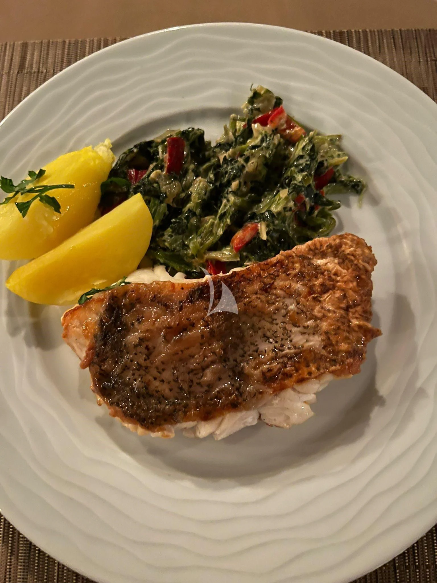 a plate of food aboard HUBO Yacht for Sale
