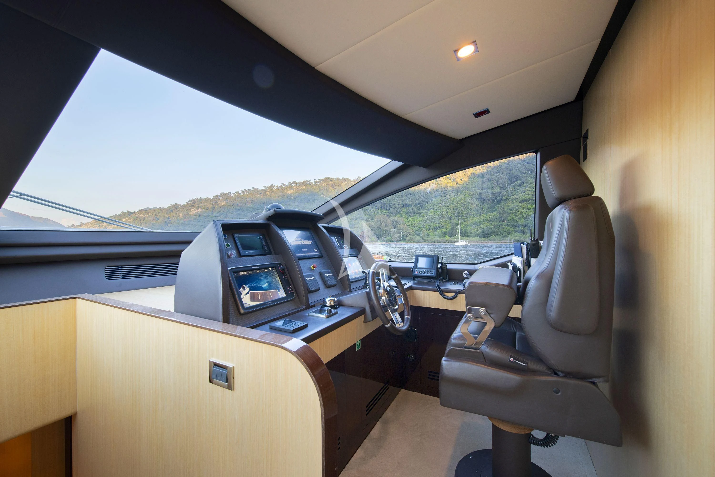inside of a car aboard HUBO Yacht for Sale