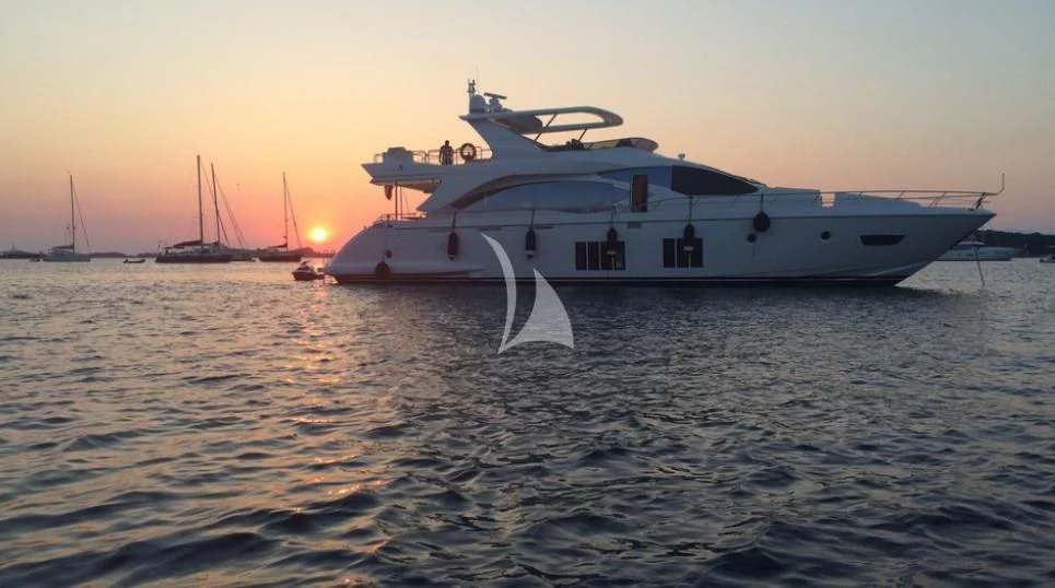 a boat in the water aboard HUBO Yacht for Sale