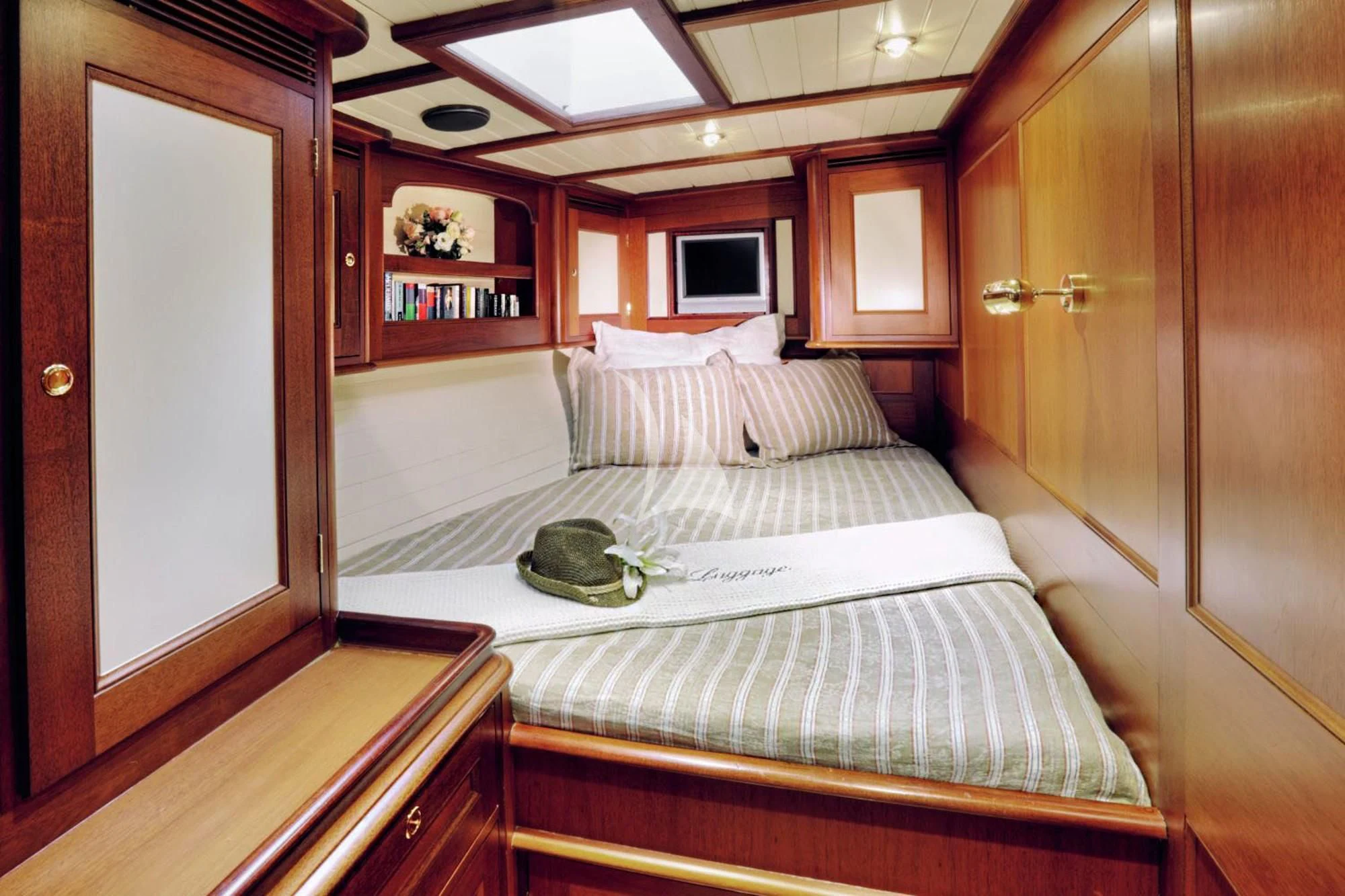 a bed in a room aboard SHAMOUN Yacht for Sale