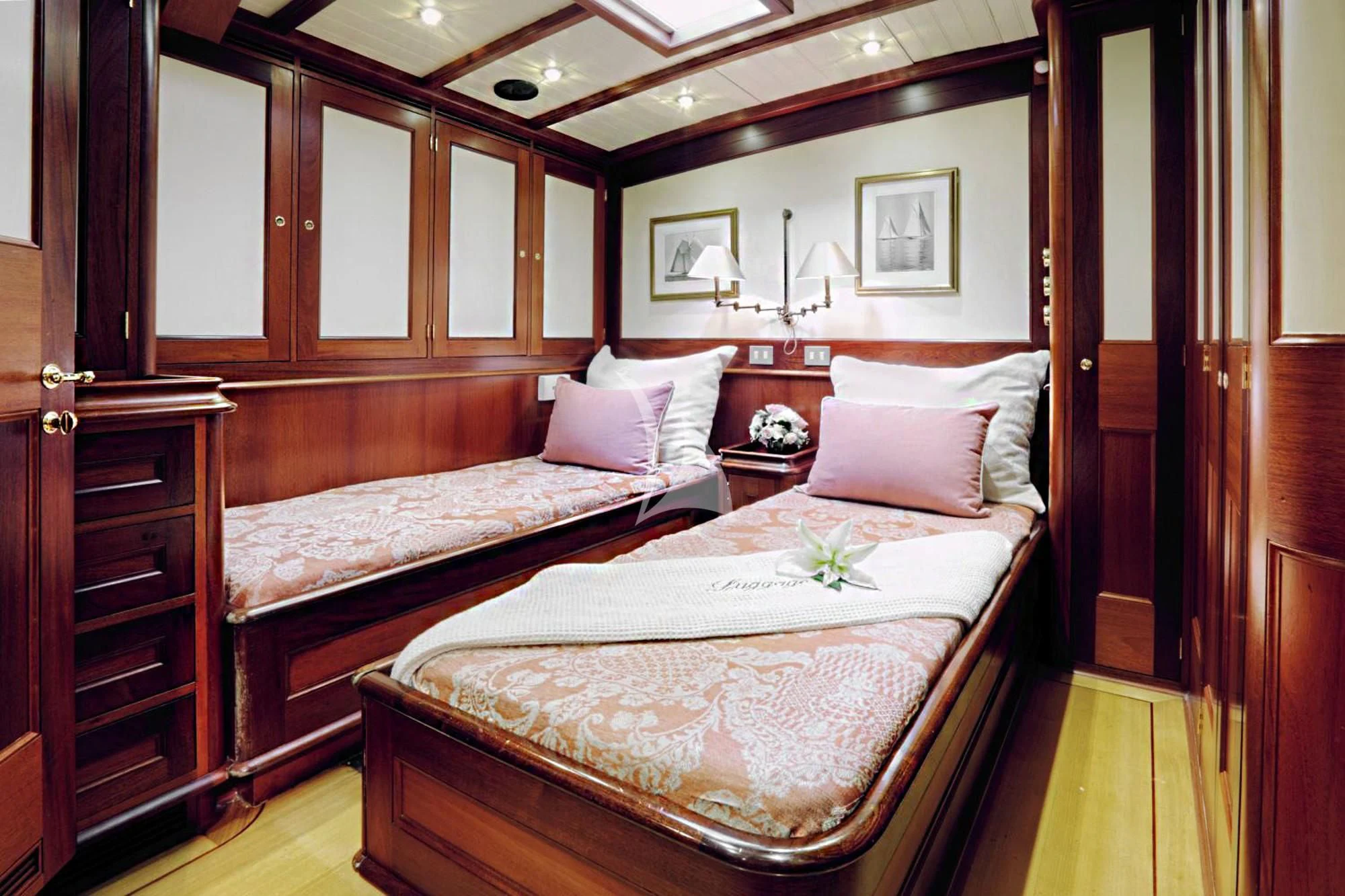 a couple of beds in a hotel room aboard SHAMOUN Yacht for Sale