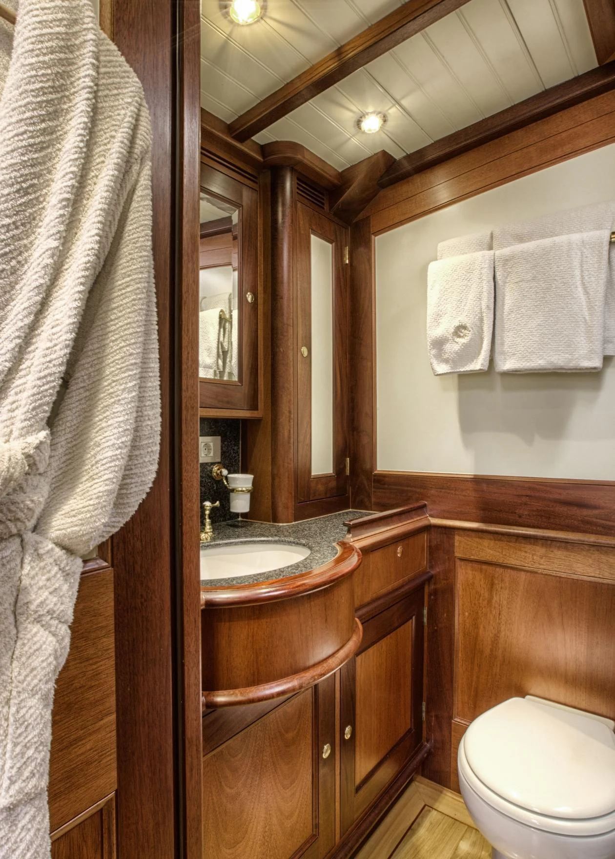 a bathroom with a sink and toilet aboard SHAMOUN Yacht for Sale