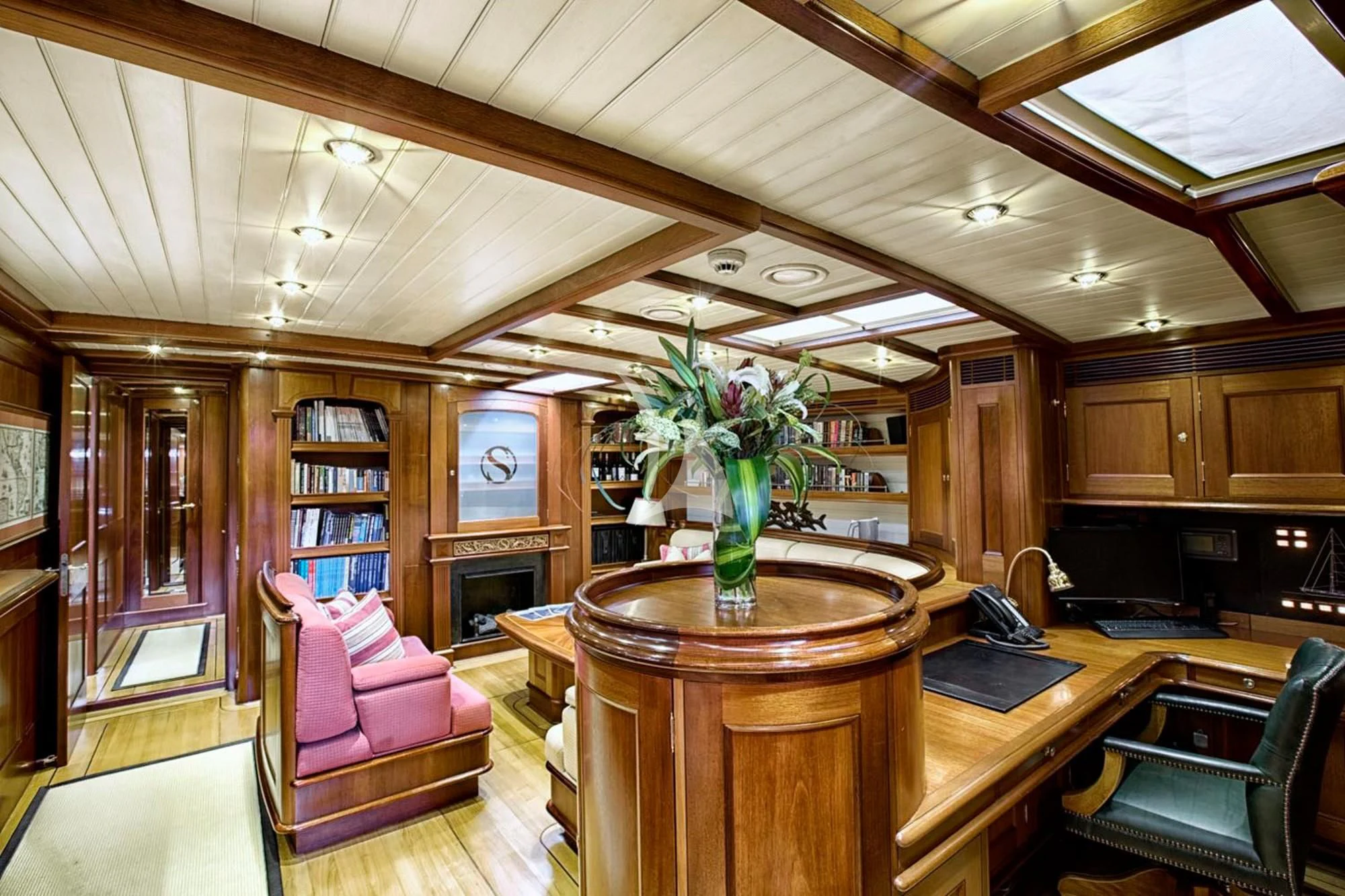 a large kitchen with a table and chairs aboard SHAMOUN Yacht for Sale