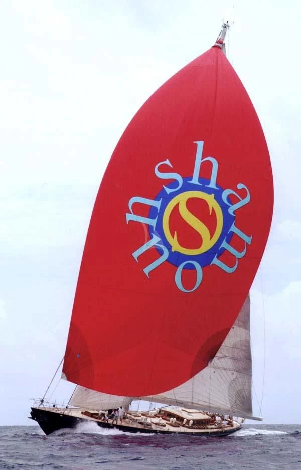 a red and white sailboat aboard SHAMOUN Yacht for Sale