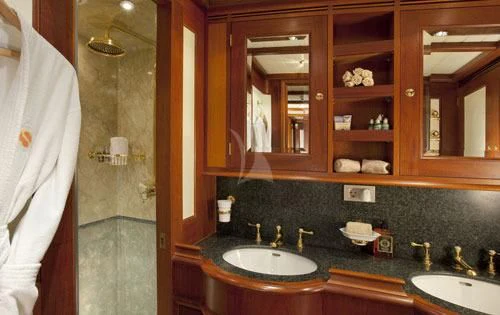 a bathroom with a sink and a mirror aboard SHAMOUN Yacht for Sale