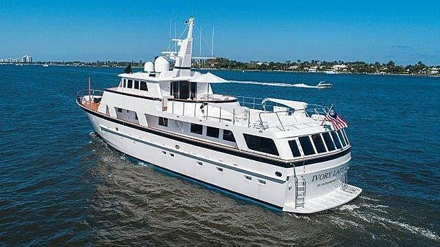 a large boat on the water aboard IVORY LADY Yacht for Sale
