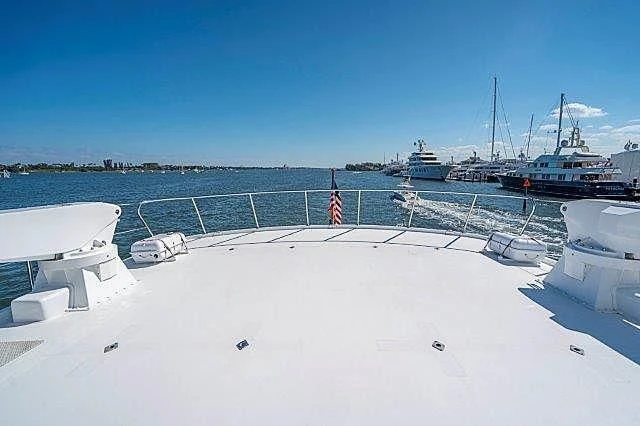 a snowy dock with boats aboard IVORY LADY Yacht for Sale