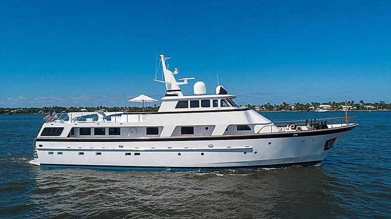 a large white boat on the water aboard IVORY LADY Yacht for Sale