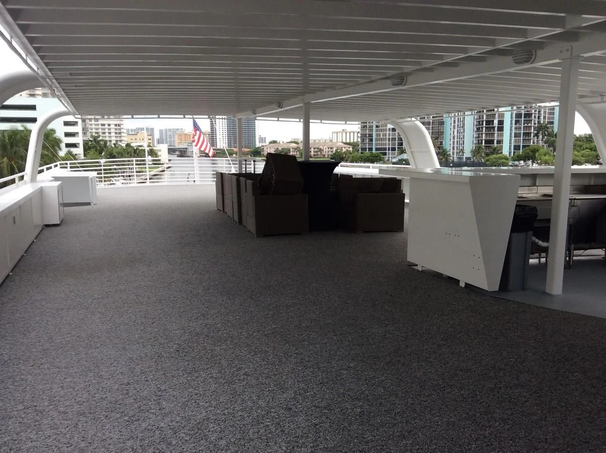 a large room with tables and chairs aboard SIR WINSTON Yacht for Sale