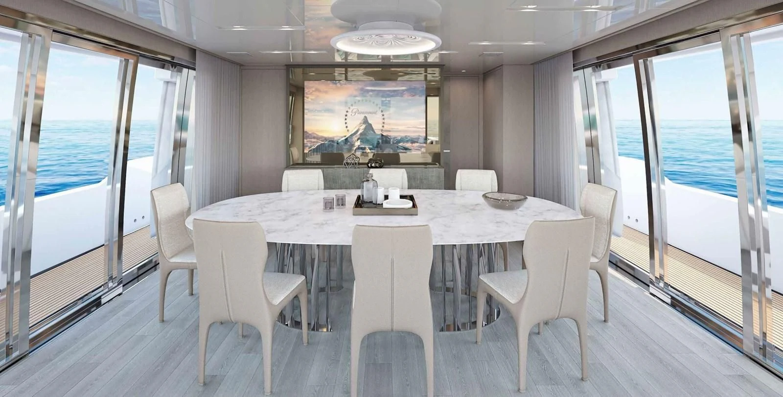 a large dining table with white chairs aboard 2021 SANLORENZO SD96 #95 Yacht for Sale