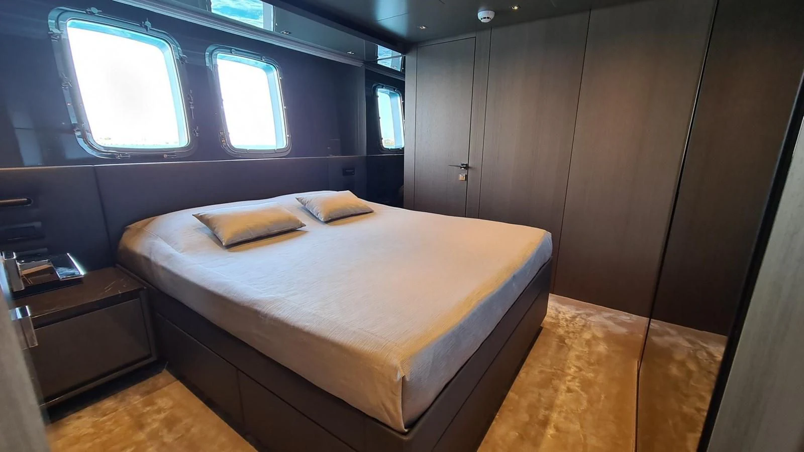 a bed in a room aboard 2021 SANLORENZO SD96 #95 Yacht for Sale