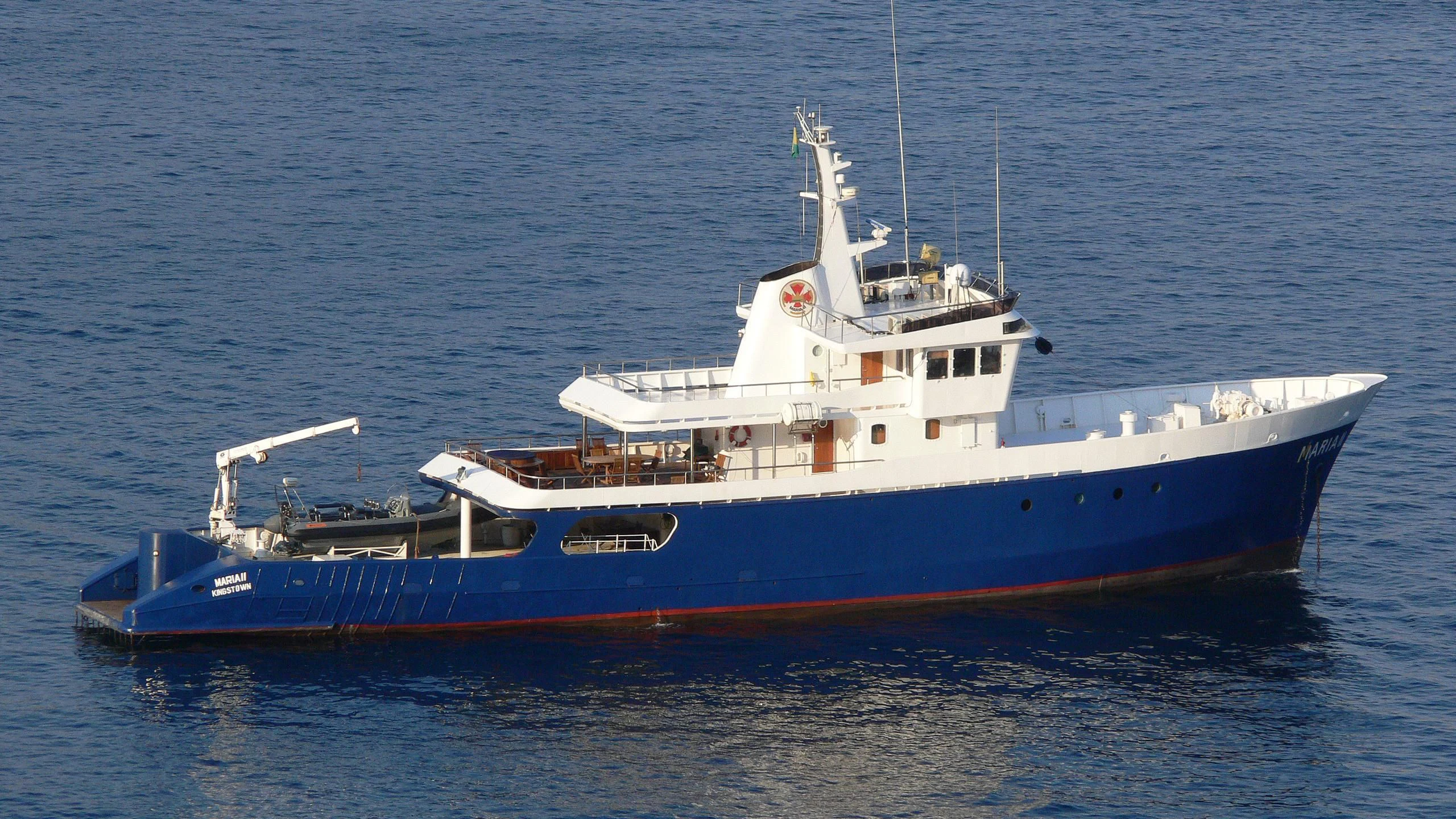 a large blue and white boat aboard MAYA'S DUGONG Yacht for Sale