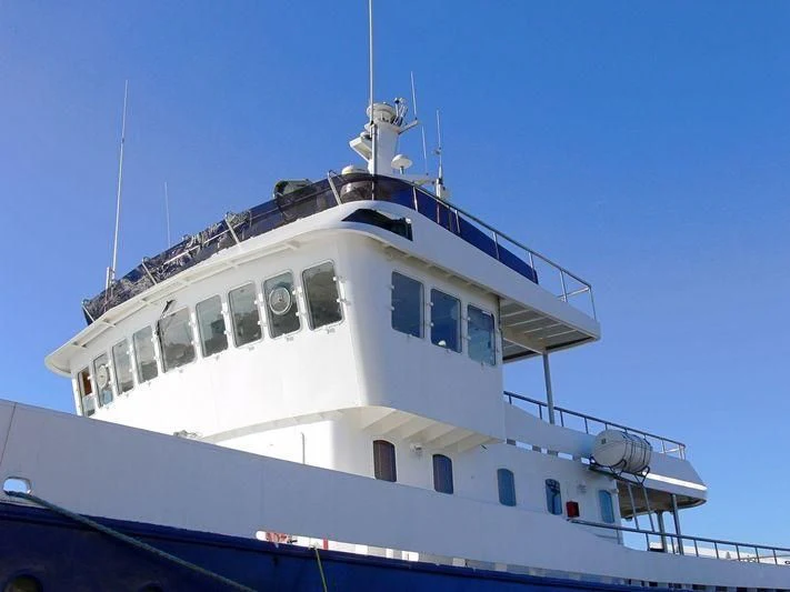 a large white boat aboard MAYA'S DUGONG Yacht for Sale