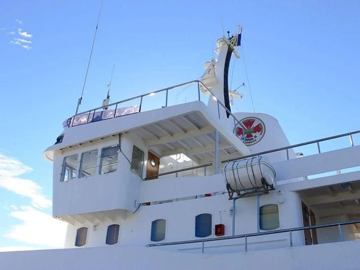 a large white boat aboard MAYA'S DUGONG Yacht for Sale