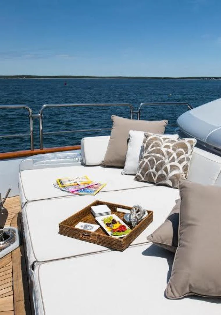 a table with a tray of food on it aboard TAIL LIGHTS Yacht for Sale