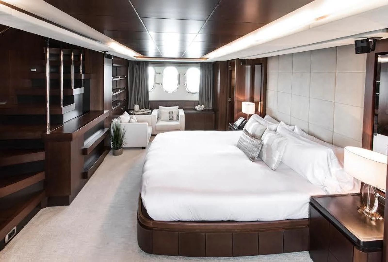 a large bedroom with a large bed aboard TAIL LIGHTS Yacht for Sale