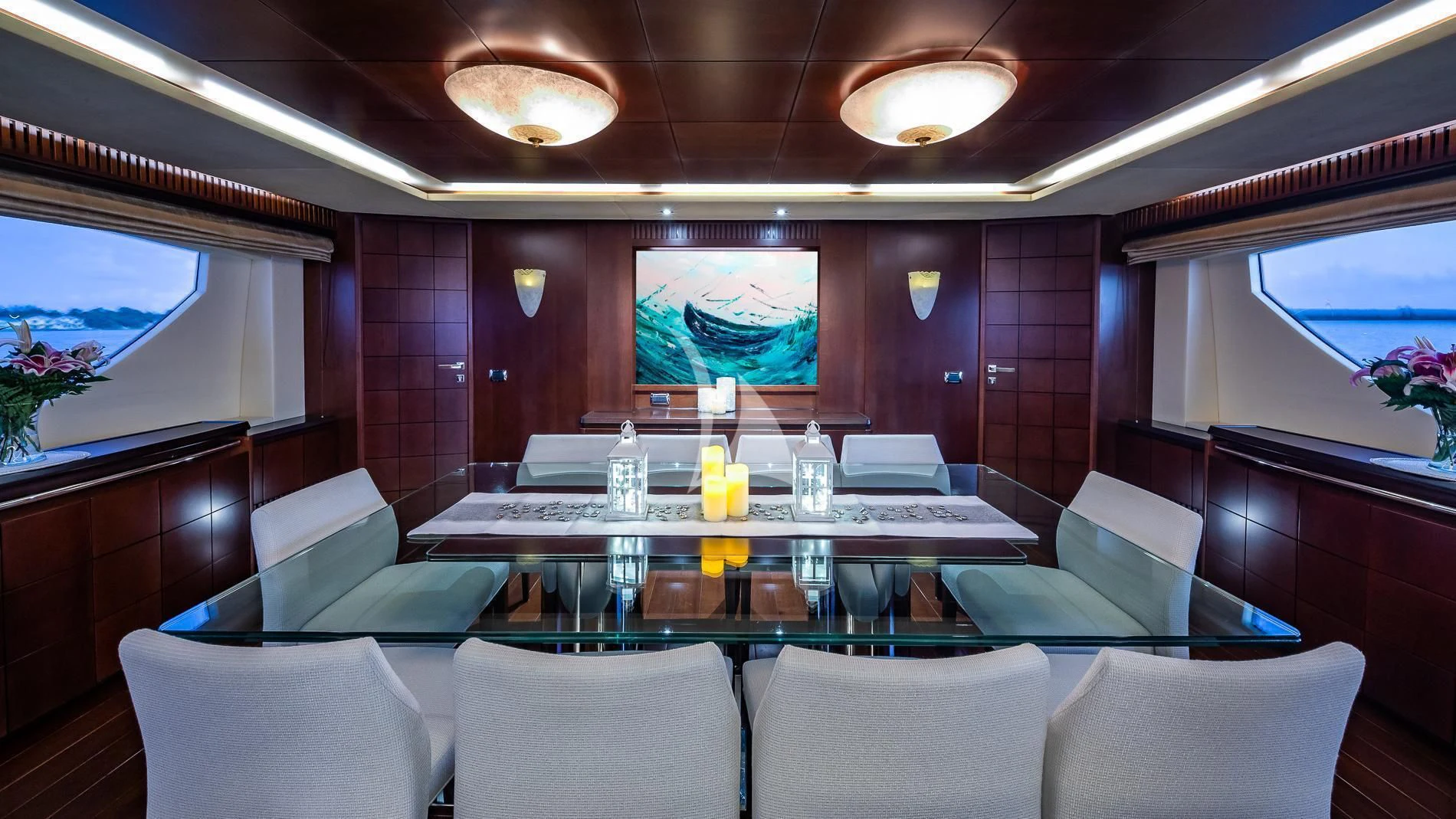 a room with a table and chairs aboard TAIL LIGHTS Yacht for Sale