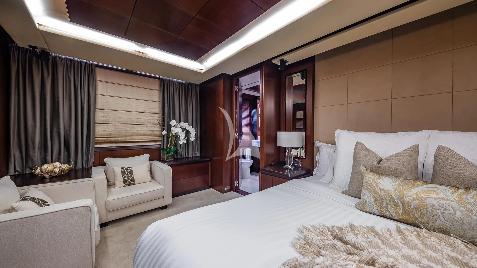 a room with a bed and a couch aboard TAIL LIGHTS Yacht for Sale