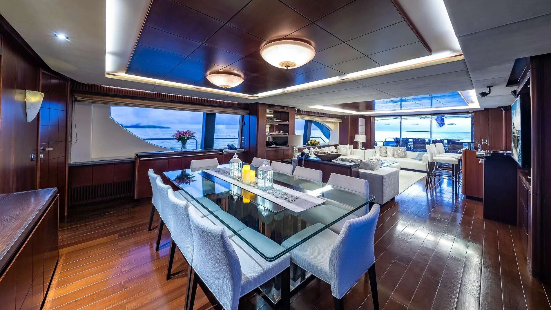 a large dining room with a table and chairs aboard TAIL LIGHTS Yacht for Sale