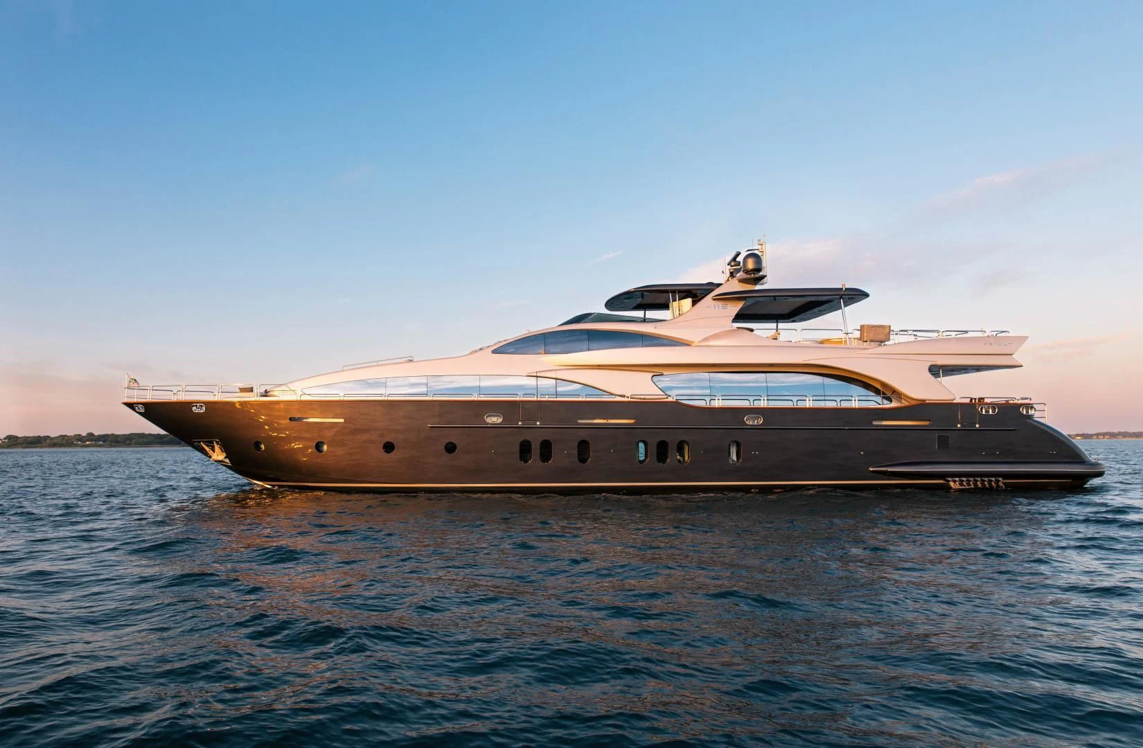 a large ship in the water aboard TAIL LIGHTS Yacht for Sale