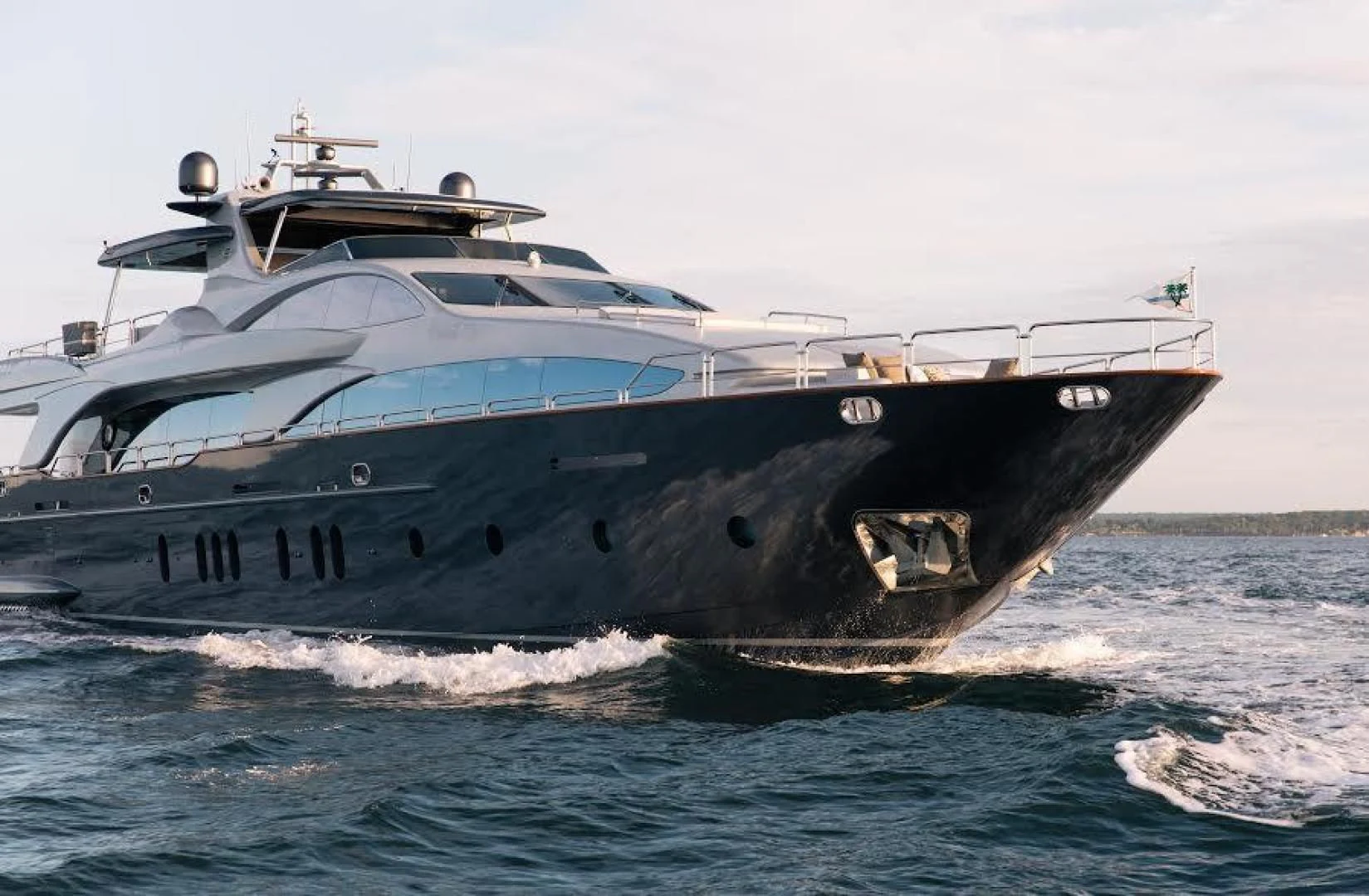 a large boat on the water aboard TAIL LIGHTS Yacht for Sale