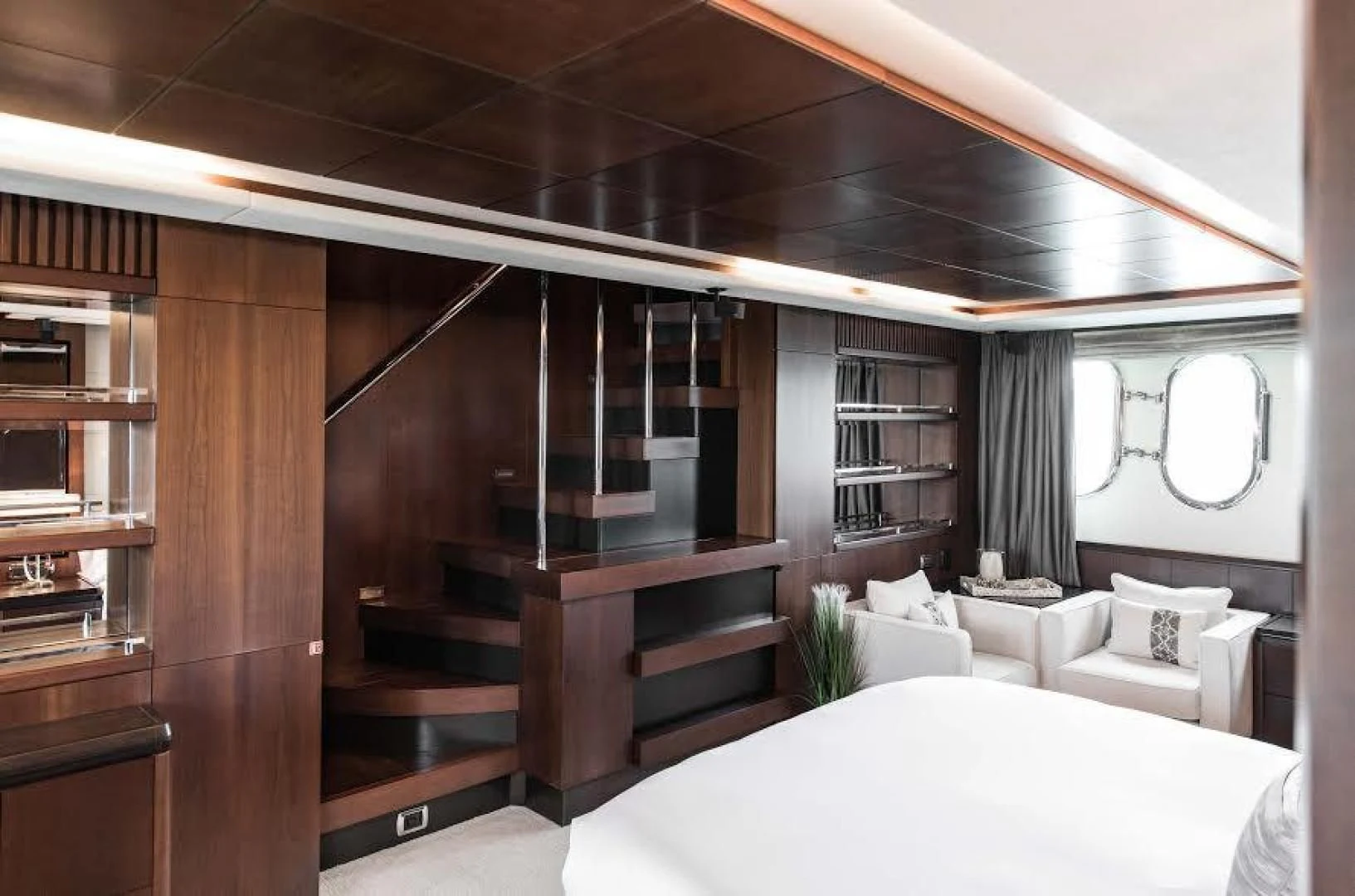 a room with a bed and a mirror aboard TAIL LIGHTS Yacht for Sale