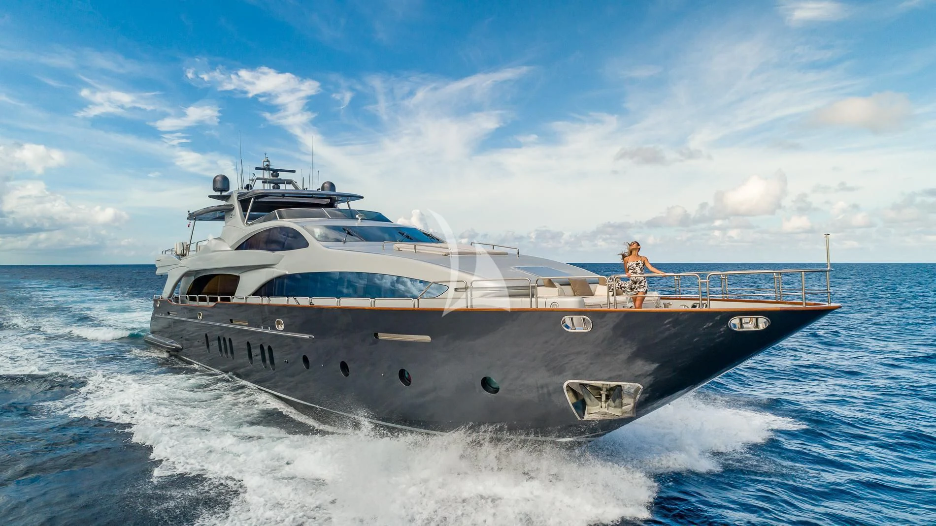 a white boat in the water aboard TAIL LIGHTS Yacht for Sale
