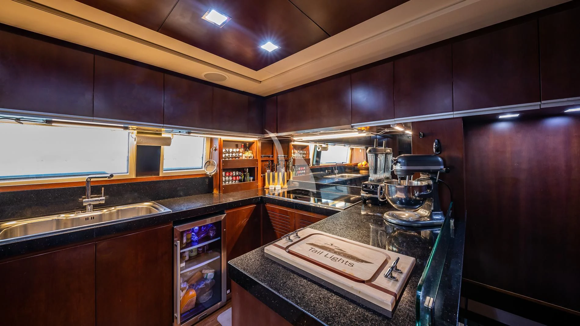 a kitchen with a stove and cabinets aboard TAIL LIGHTS Yacht for Sale