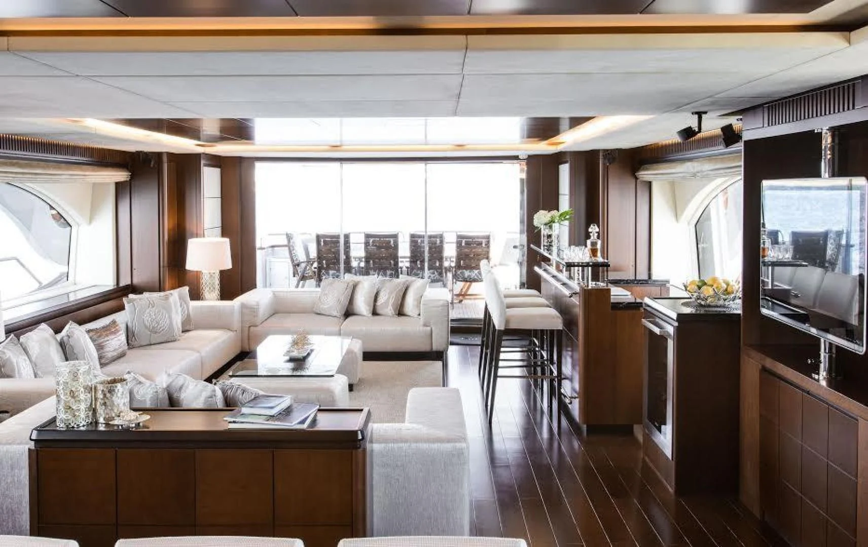 a living room with a large window aboard TAIL LIGHTS Yacht for Sale