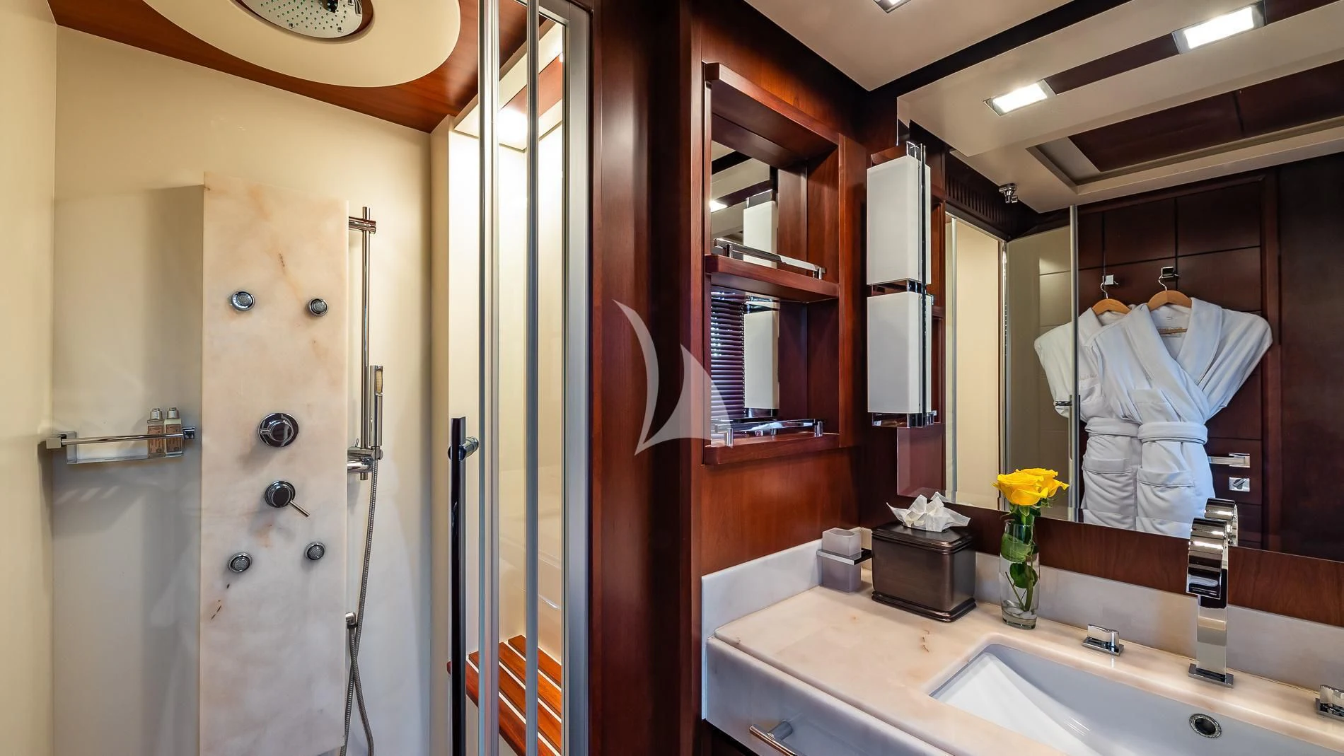 a bathroom with a shower and sink aboard TAIL LIGHTS Yacht for Sale