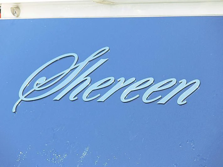 a blue sign with writing aboard SHEREEN Yacht for Sale