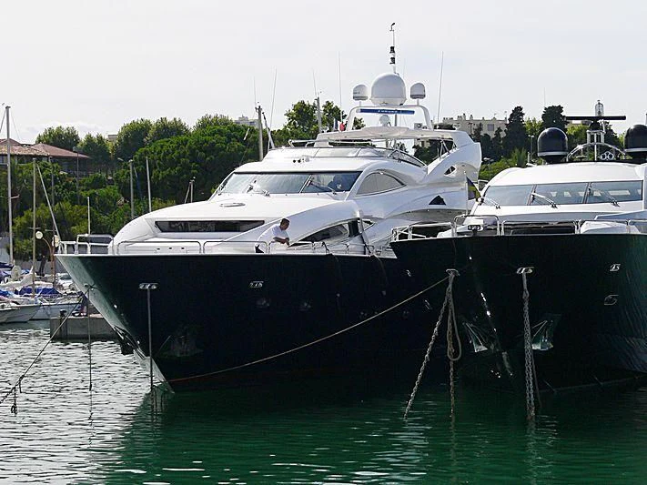 a group of boats are parked in a harbor aboard SHEREEN Yacht for Sale
