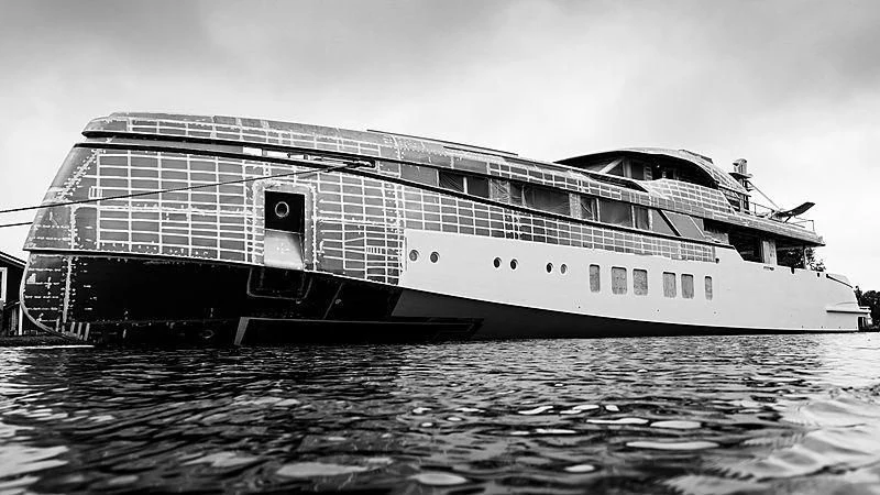 a large cruise ship in the water aboard TOTALLY NUTS Yacht for Sale