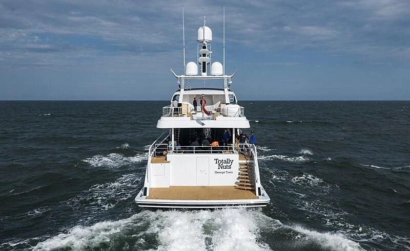 a boat on the water aboard TOTALLY NUTS Yacht for Sale