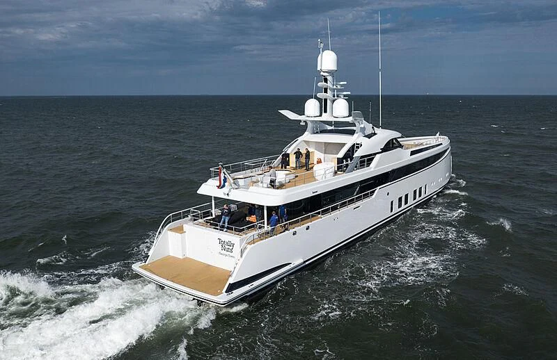 a boat on the water aboard TOTALLY NUTS Yacht for Sale