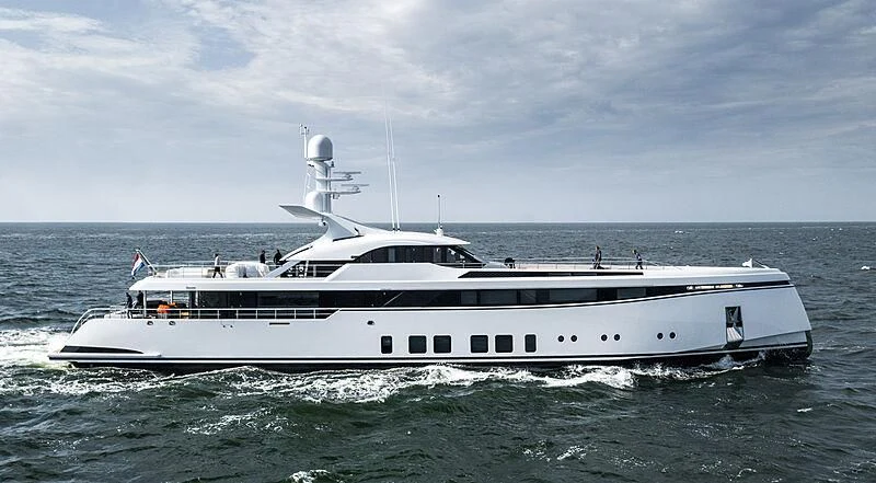a white boat in the water aboard TOTALLY NUTS Yacht for Sale