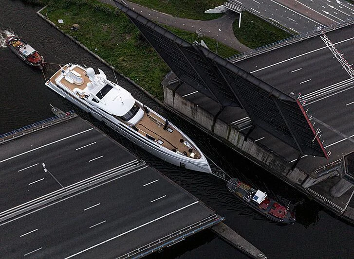 a large military ship on a road aboard TOTALLY NUTS Yacht for Sale