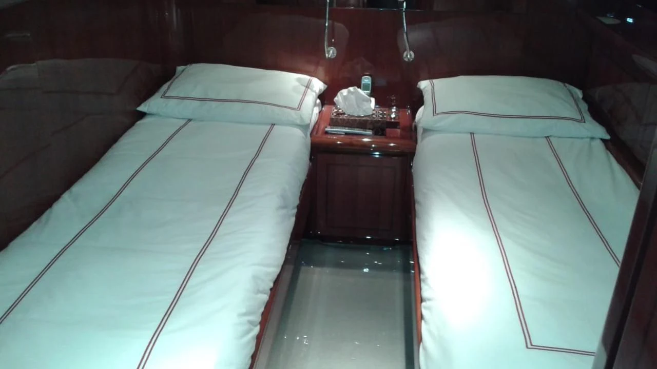a couple of beds in a room aboard PRINCESS AYESHA I Yacht for Sale