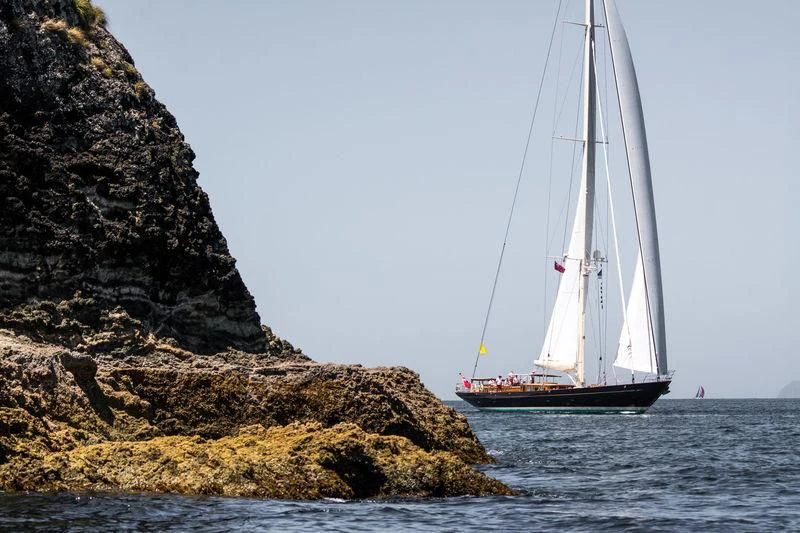 a sailboat on the water aboard PUMULA Yacht for Sale