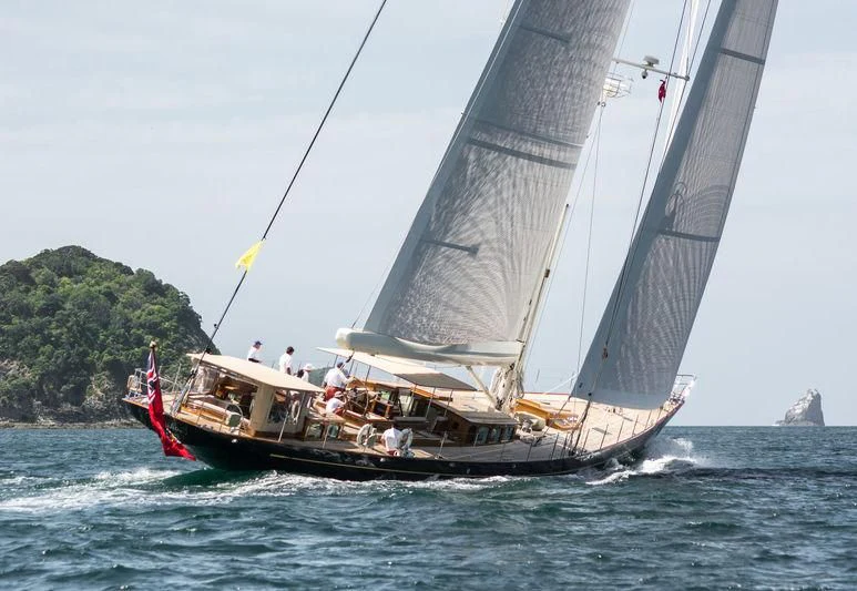 a sailboat with people on it aboard PUMULA Yacht for Sale