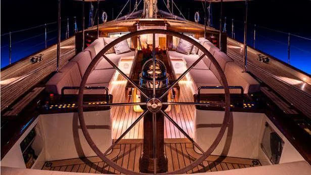 a large orange and black object aboard PUMULA Yacht for Sale