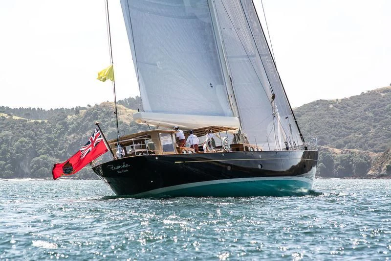 a sailboat with people on it aboard PUMULA Yacht for Sale