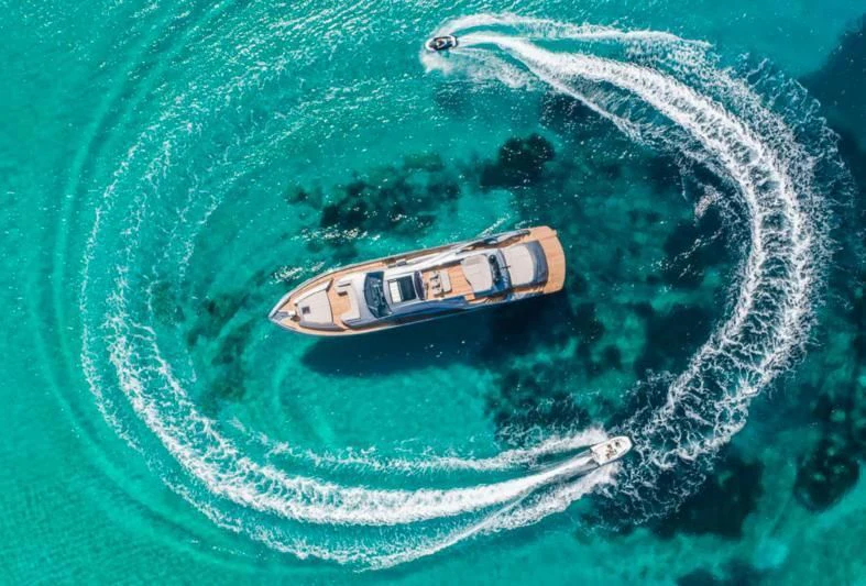 a high angle view of a car driving on a road aboard XAMAN Yacht for Sale