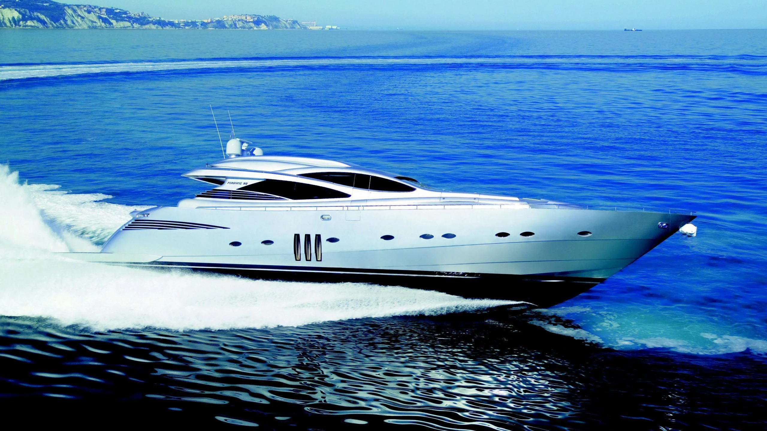 a white yacht in the water aboard XAMAN Yacht for Sale