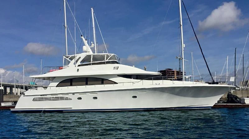 a white yacht in the water aboard MOONSHINE Yacht for Sale