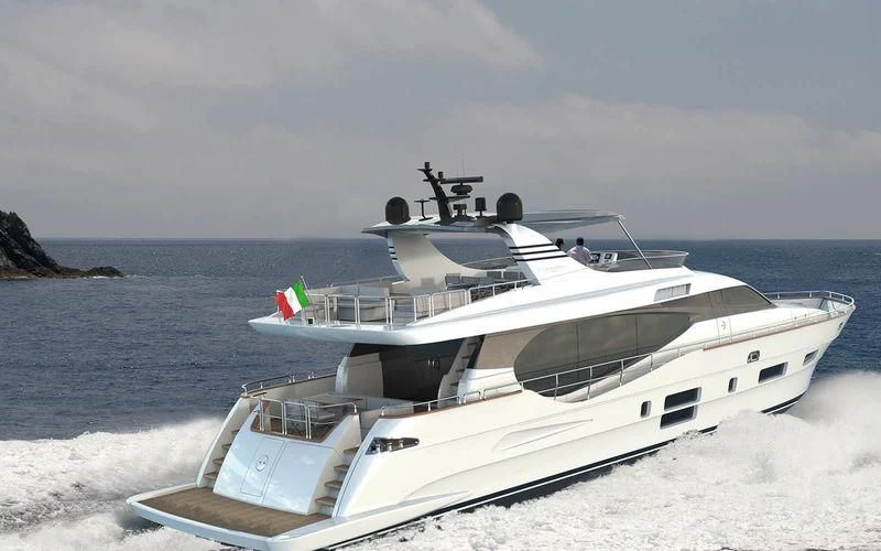 a boat on a beach aboard PASSION VI Yacht for Sale
