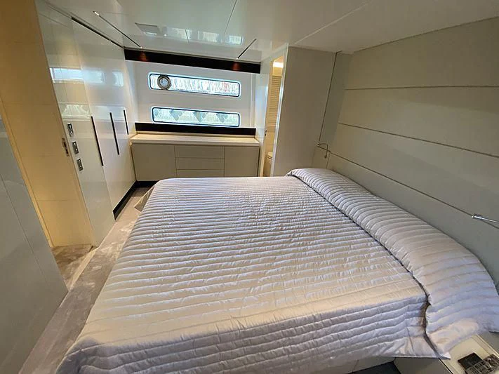 a bed in a room aboard PASSION VI Yacht for Sale