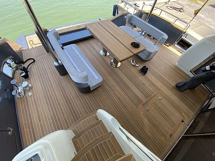 a boat on a deck aboard PASSION VI Yacht for Sale